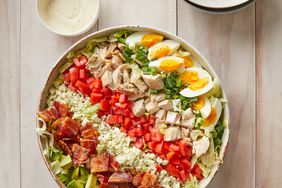 overhead angle looking down at a large bowl of cobb salad