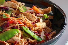 close up view of Skillet Slaw with vegetables and noodles in a bowl