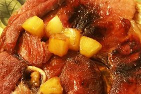 overhead view of Brown Sugar Ham Steak with pineapple on top