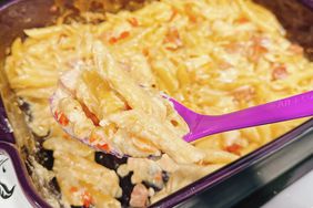 baking dish with penne, shrimp, and creamy sauce