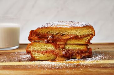 PB&J French Toast sandwich dusted with powdered sugar