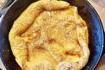Dutch baby on a blue plate