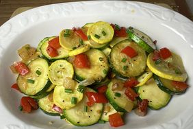 Sauteed zucchini and squash with red peppers and chives