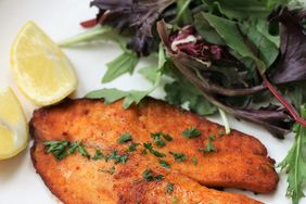 Air Fryer Tilapia with parsley and salad