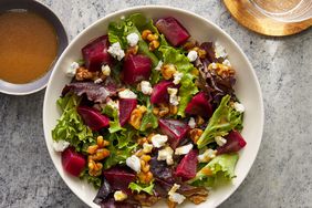 looking down at a bowl of beet salad with goat cheese 