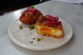 Crispy Fried Poached Eggs on plate